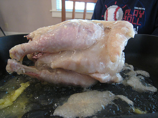 Illustration for article titled Oh God, It's a Whole Chicken in a Can